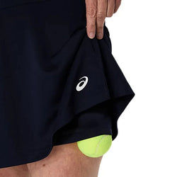 Navy blue tennis skirt with a visible brand logo on a white background
