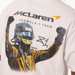 White t-shirt with McLaren Formula 1 Team graphic on a person