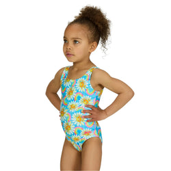 Child wearing a colorful swimsuit with floral pattern on a white background
