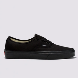 Black Vans sneaker on a light gray background