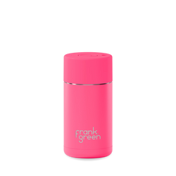 Pink reusable water bottle with 'frank green' branding on a white background