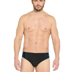 Man wearing black swim briefs with blue pattern on a white background